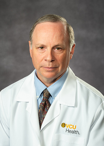 로렌스 디나르도, MD